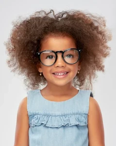 Kids Dentist Palm Beach Gardens - kid with glasses